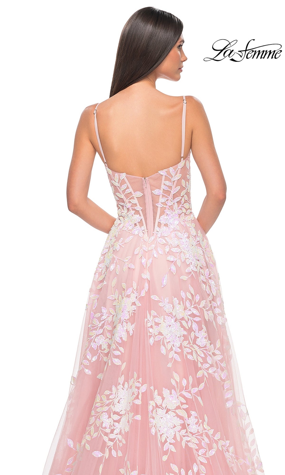 Woman in a La Femme Sequin-Print Long A-Line Prom Dress 32223 with thin straps, shown from the back against a plain white background.